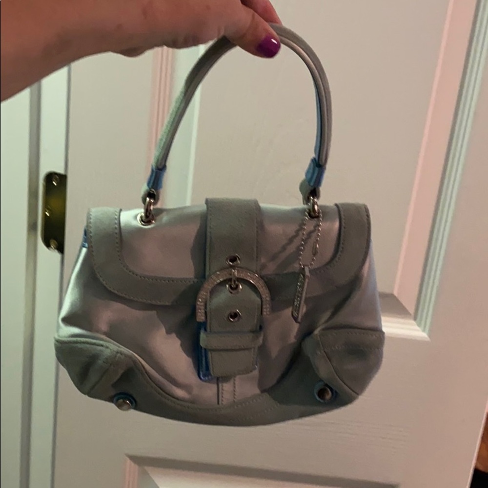 Satin and suede mini Coach bag.